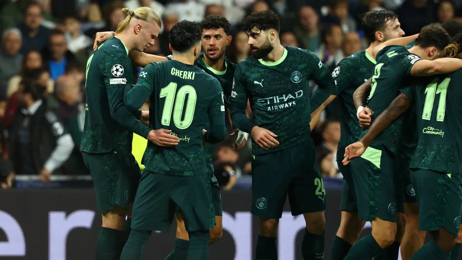 Joueurs de Manchester City célébrant un but