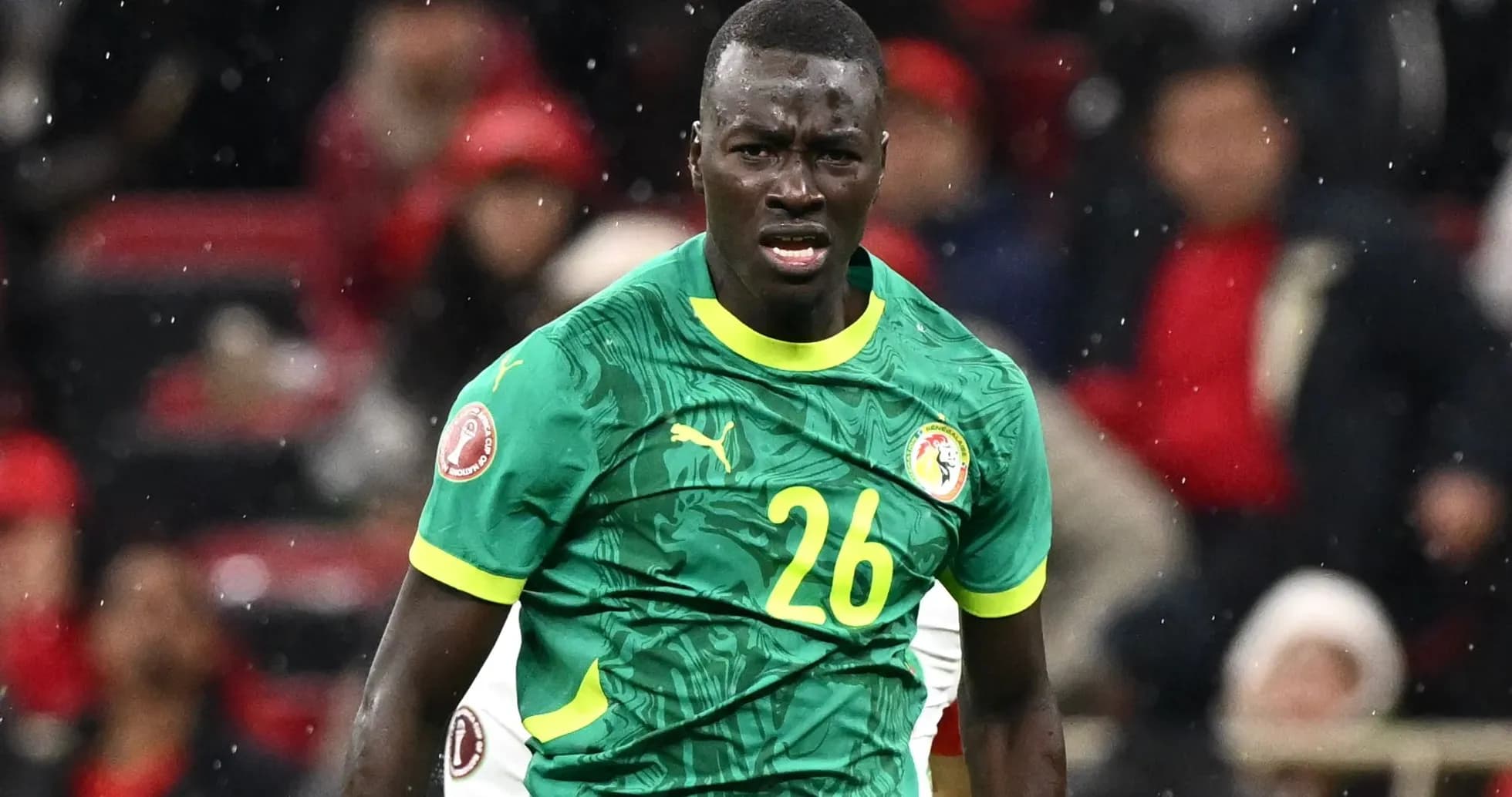 Joueur sénégalais en action sur le terrain