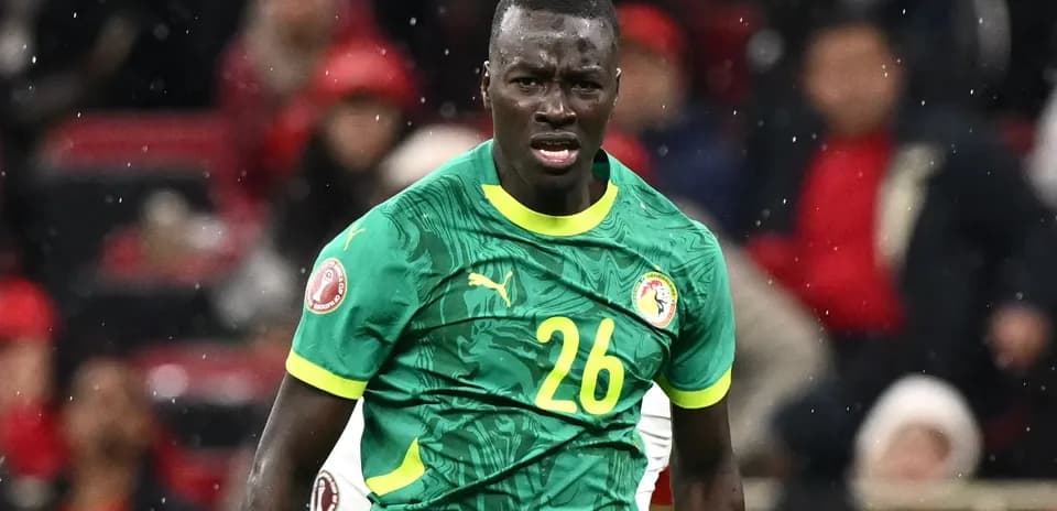 Joueur sénégalais en action sur le terrain