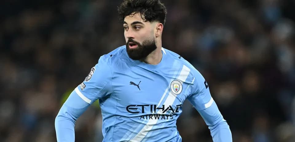 Joueur de Manchester City en action sur le terrain