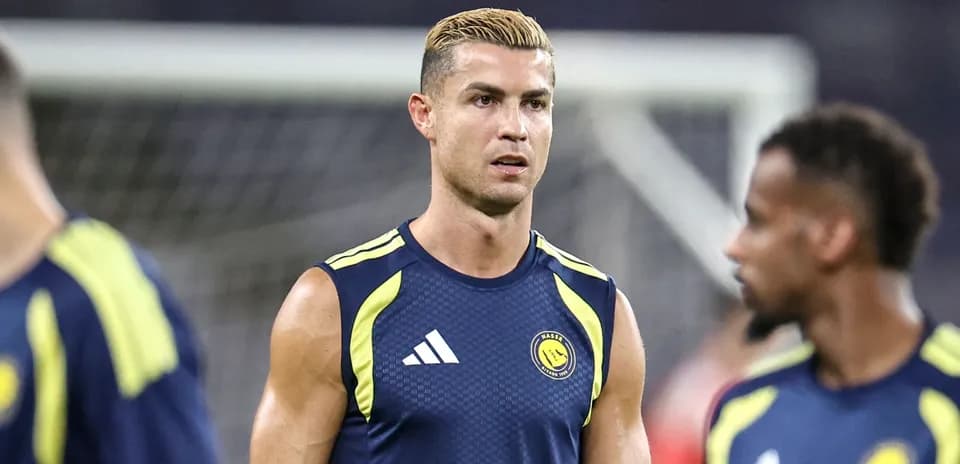 Joueur s'entraînant avant le match, maillot bleu