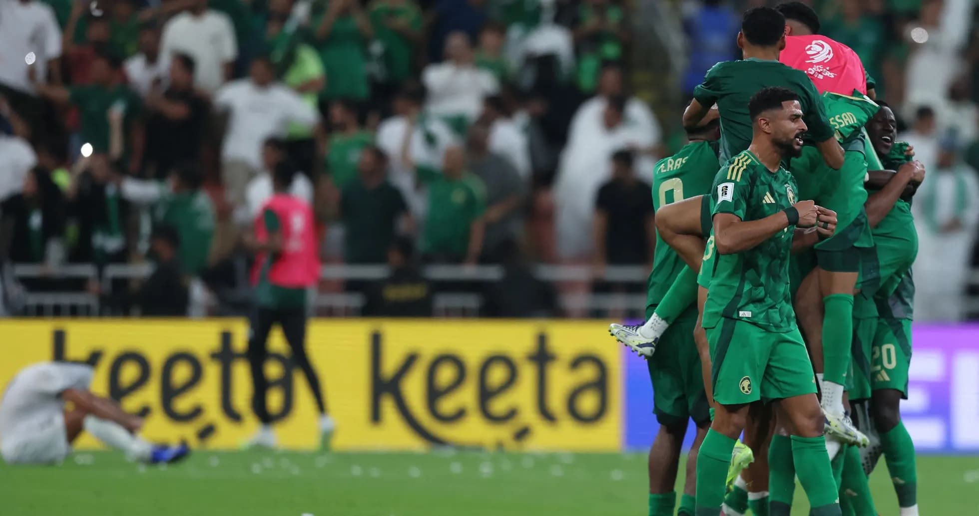 Joueurs marocains célébrant une victoire sur le terrain
