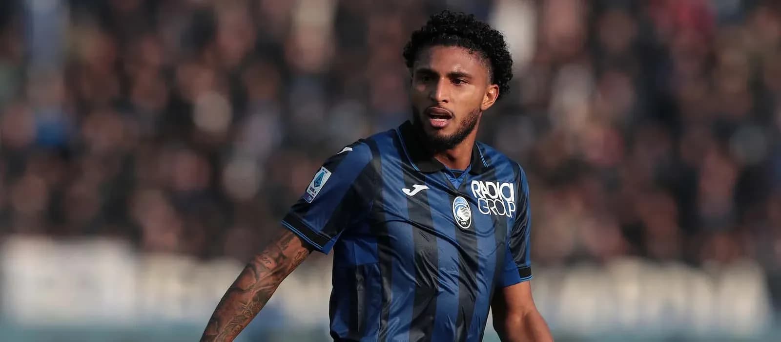 Joueur d'Atalanta en action sur le terrain