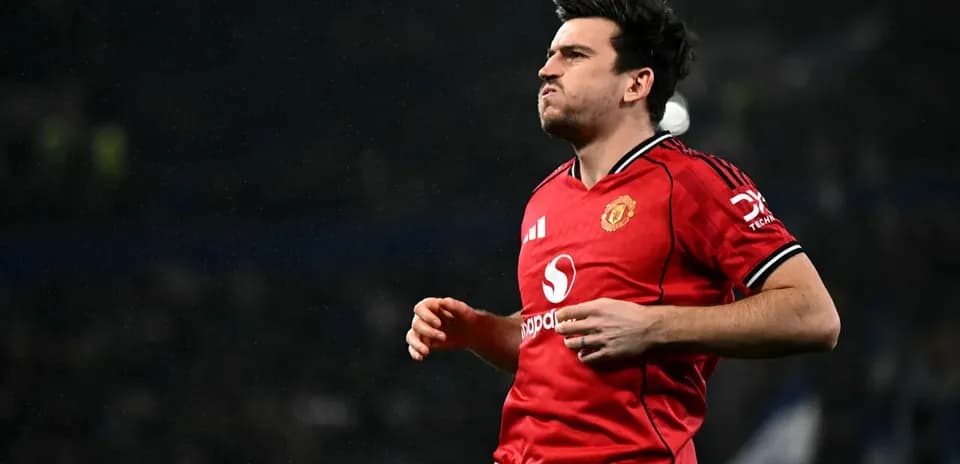 Joueur de Manchester United courant sur le terrain