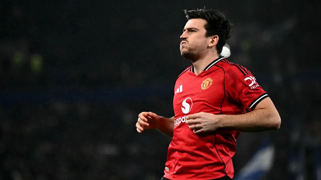 Joueur de Manchester United courant sur le terrain