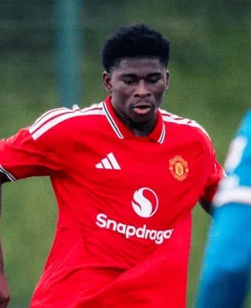 Joueur de Manchester United en action sur le terrain