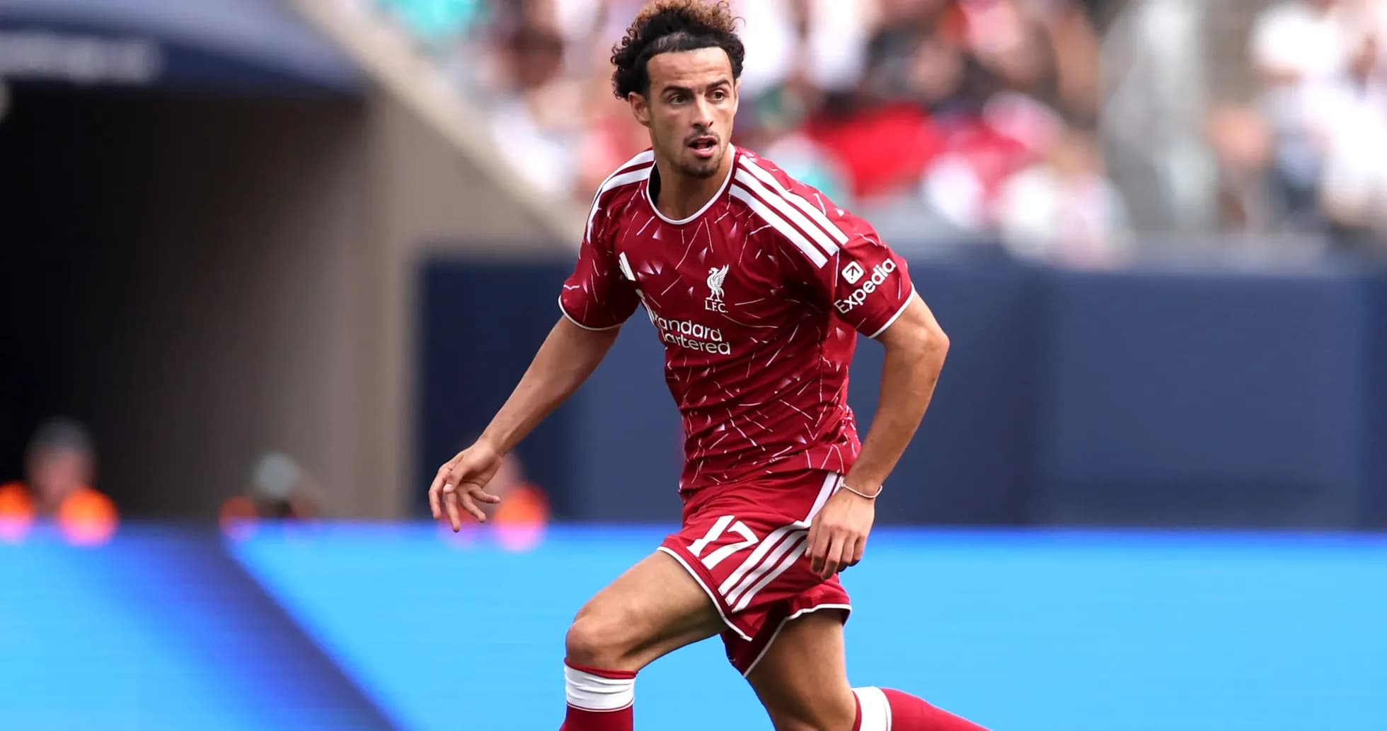 Joueur de Liverpool en action sur le terrain