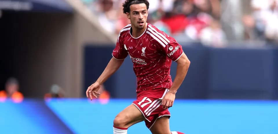 Joueur de Liverpool en action sur le terrain