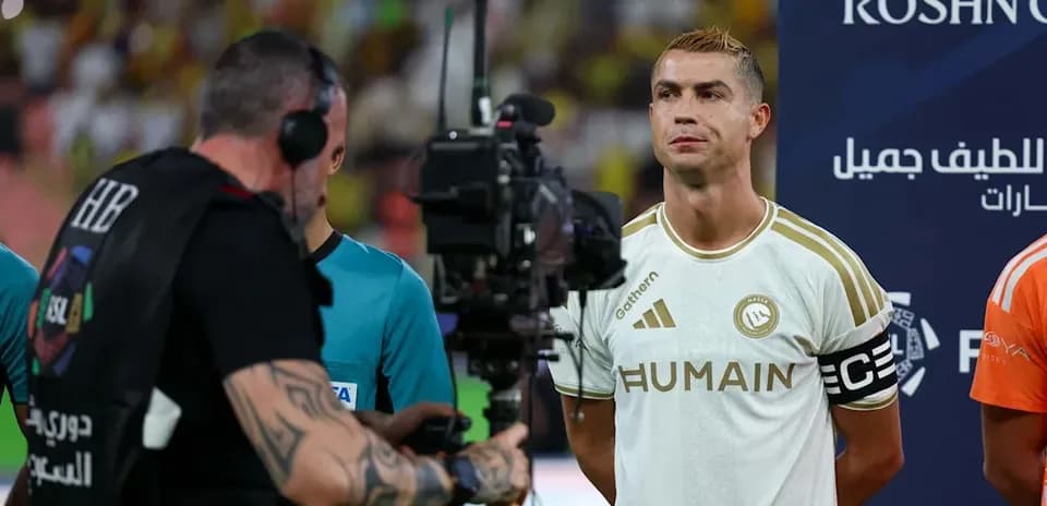 Cristiano Ronaldo standing before the match with camera