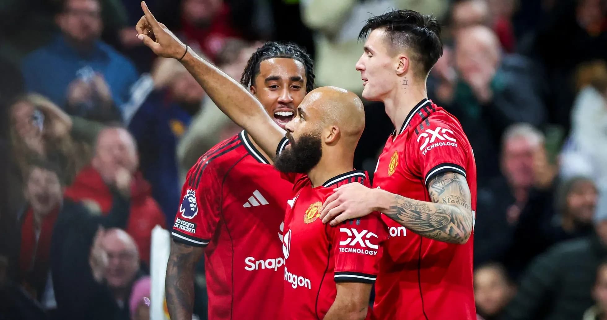 Joueurs de Manchester United célébrant un but