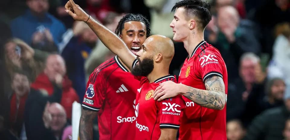 Joueurs de Manchester United célébrant un but