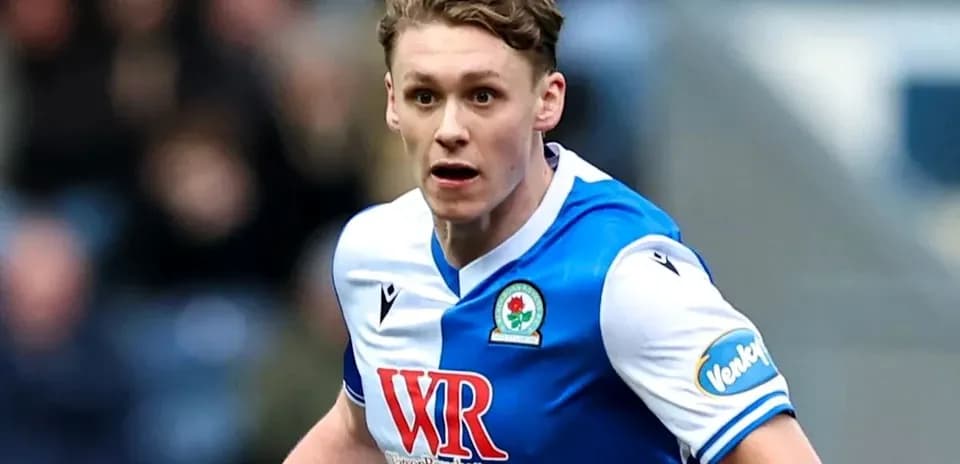 Joueur de Blackburn Rovers en action sur le terrain