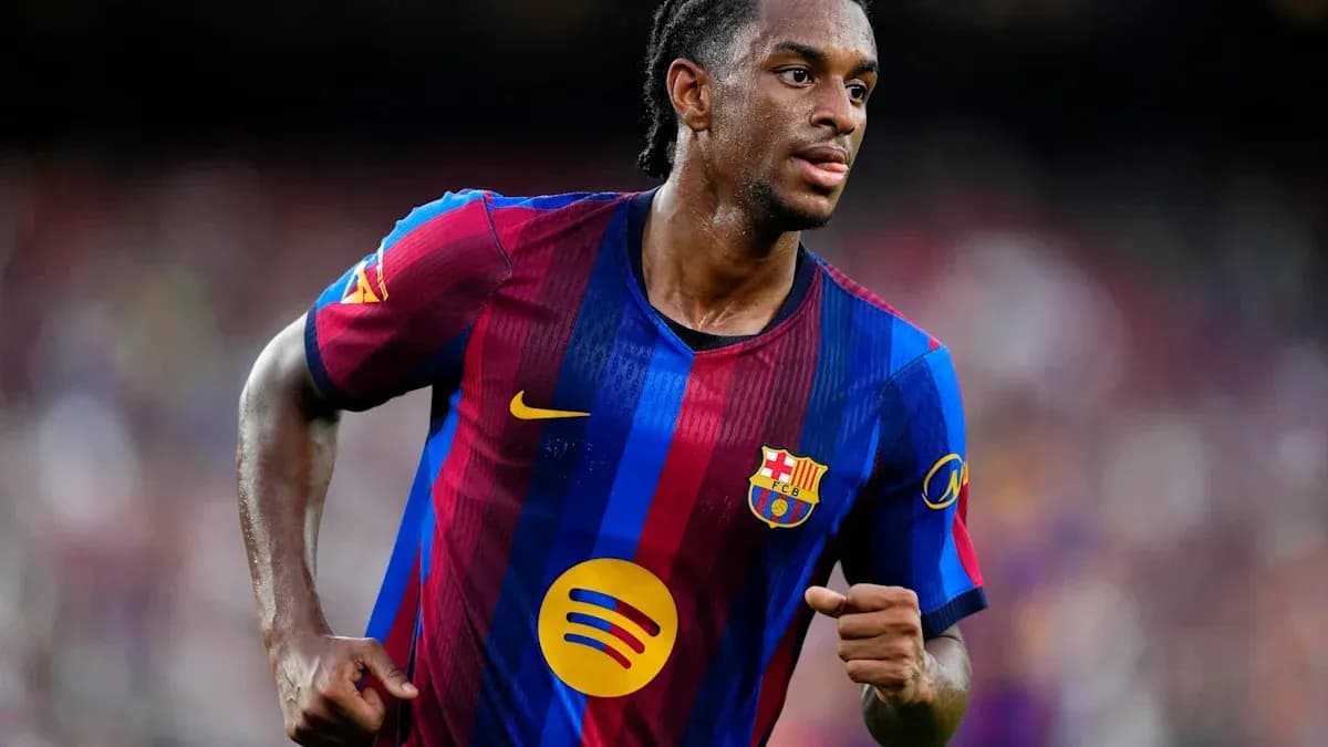 Joueur de FC Barcelone courant sur le terrain