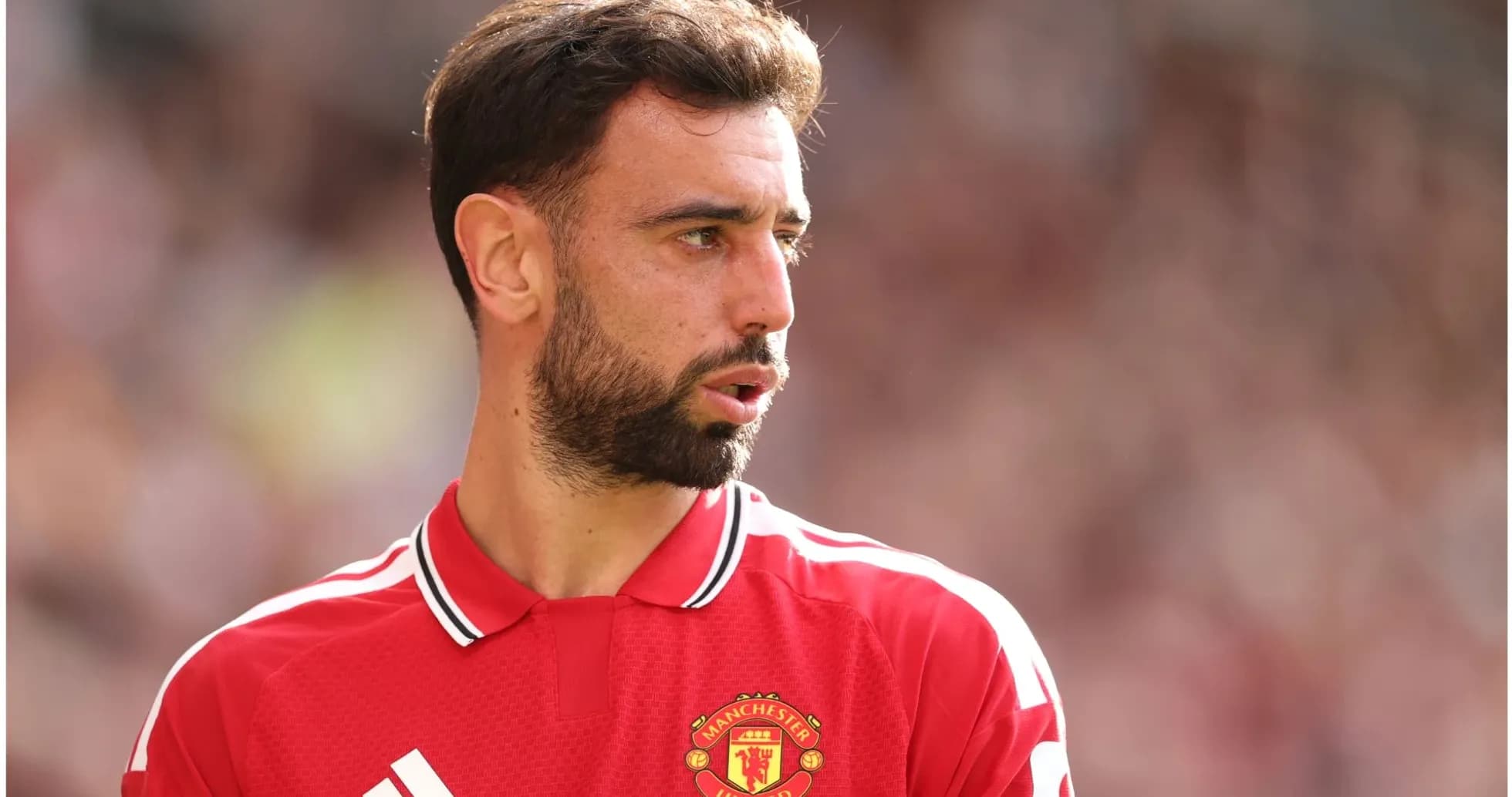 Joueur de Manchester United en maillot rouge