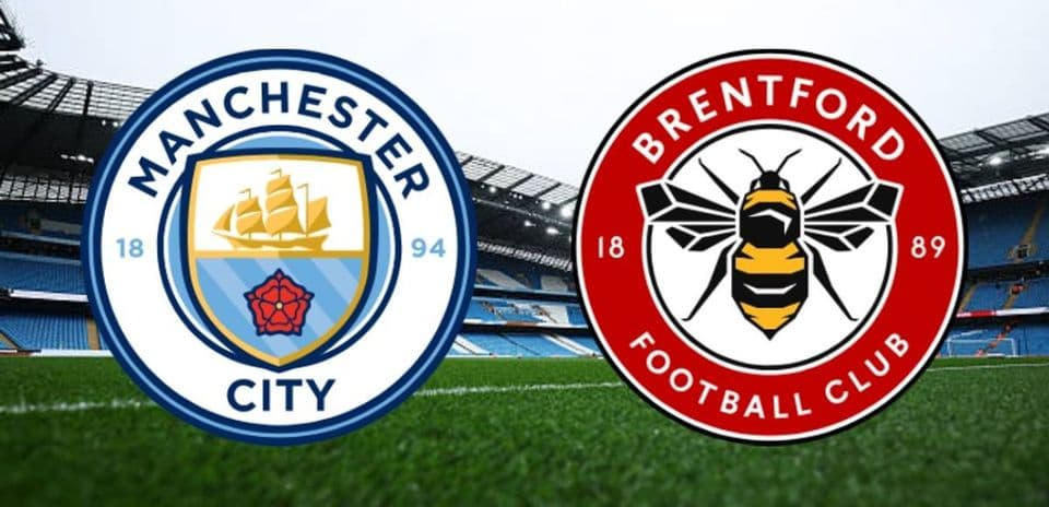 Logos de Manchester City et Brentford sur terrain