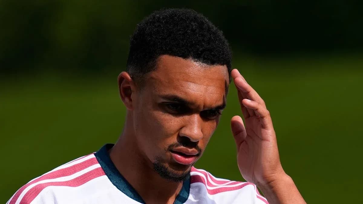 Joueur se touchant la tête lors d'un entraînement Joueur se touchant la tête lors d'un entraînement