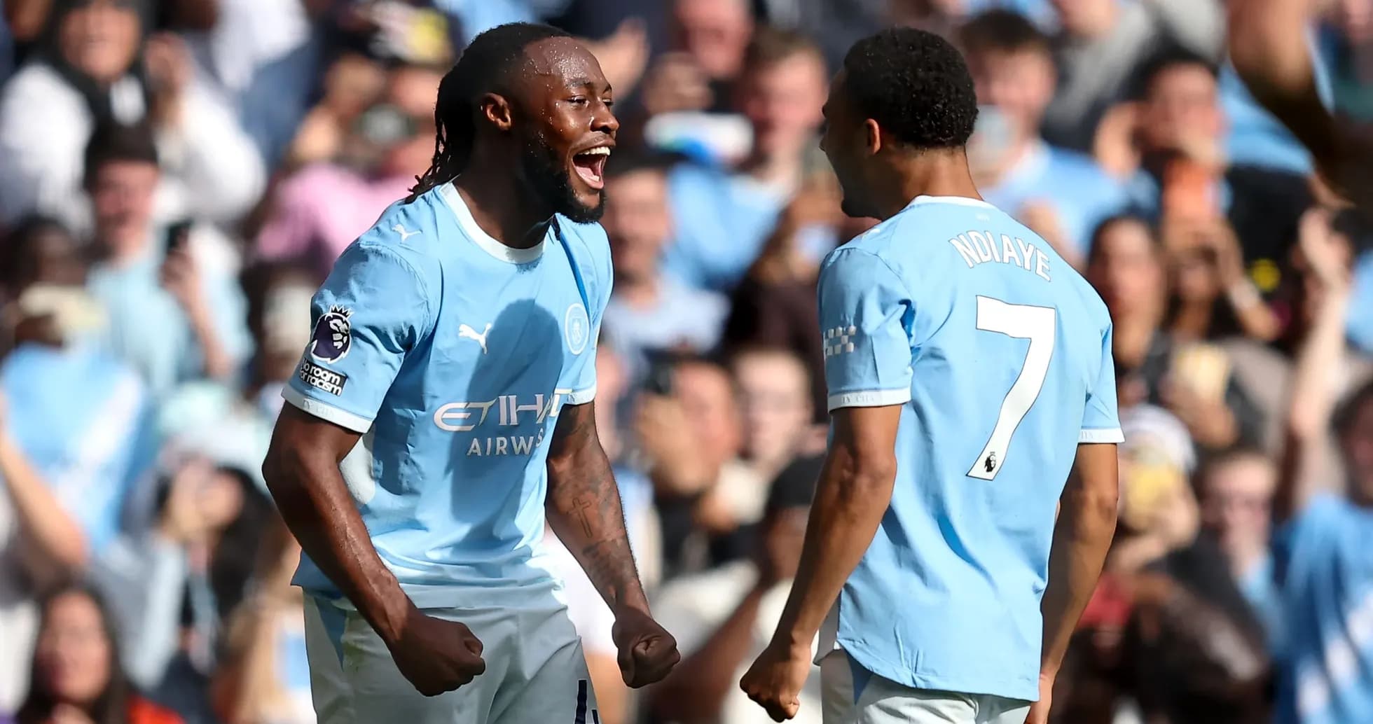 Joueurs de Manchester City célébrant un but