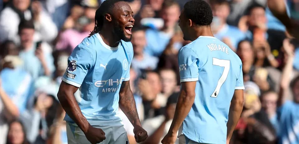 Joueurs de Manchester City célébrant un but