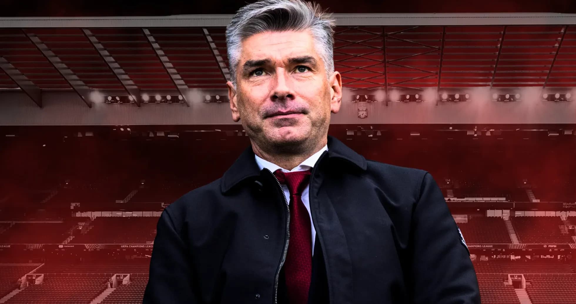 Entraîneur posant devant un stade de football