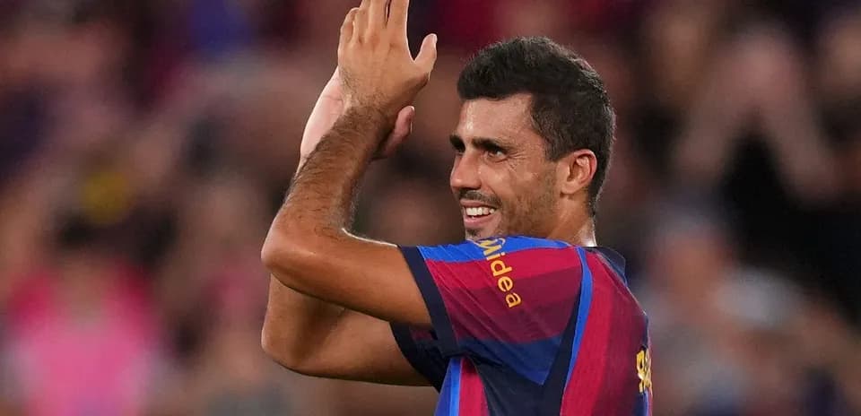 Joueur du FC Barcelone saluant les supporters