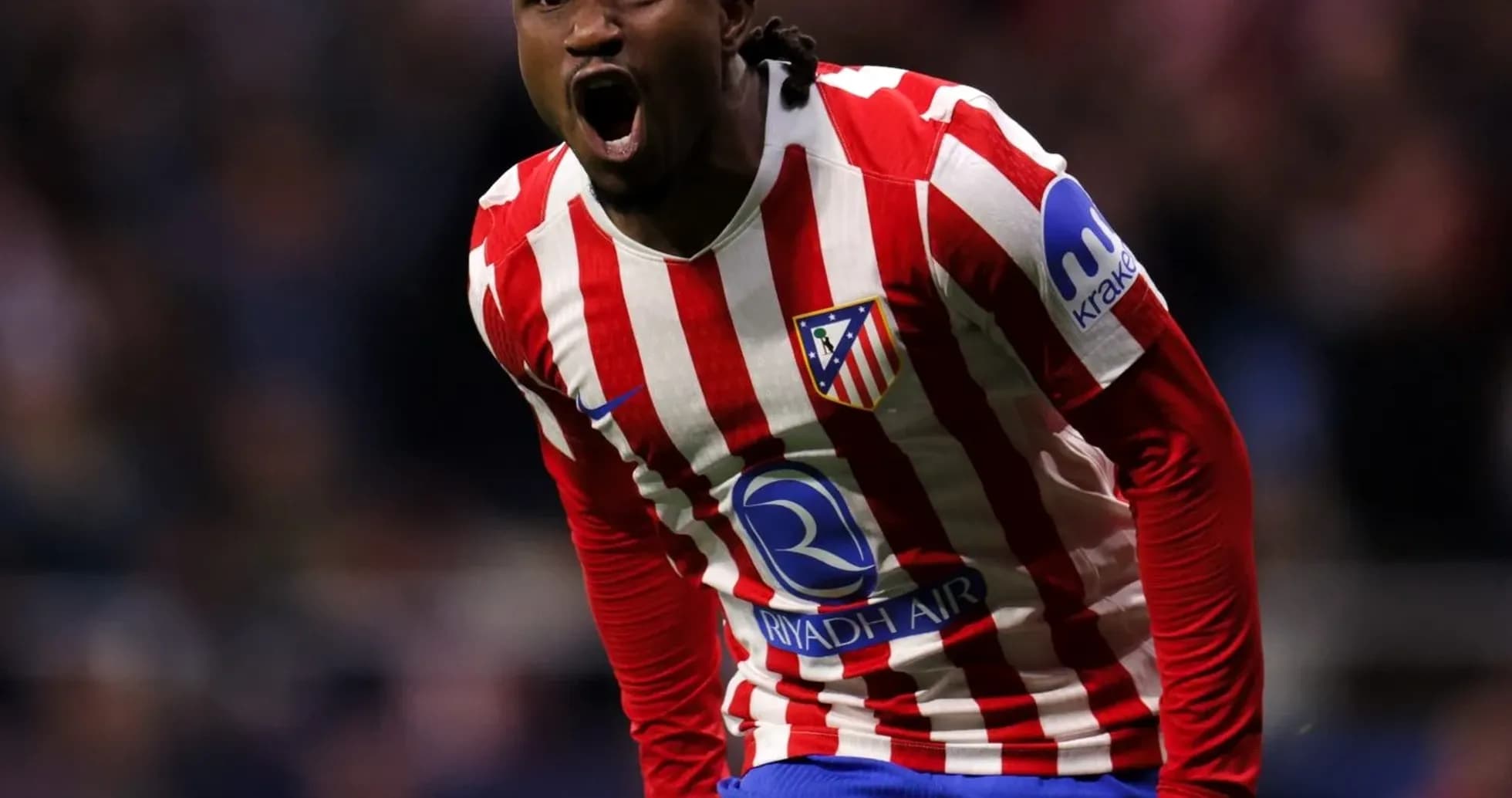 Joueur d'Atlético célébrant un but avec passion