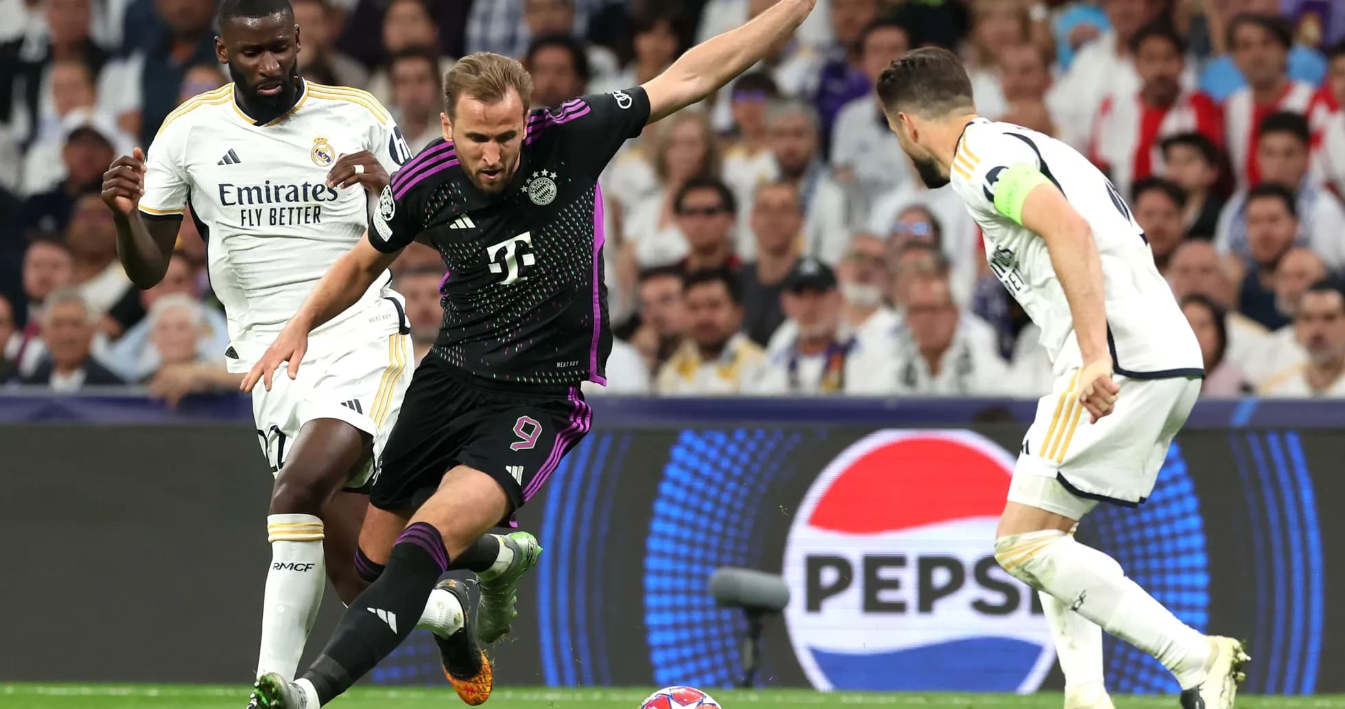 Harry Kane dribbles pendant un match contre Madrid