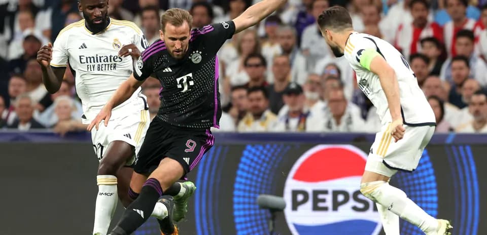 Harry Kane dribbles pendant un match contre Madrid