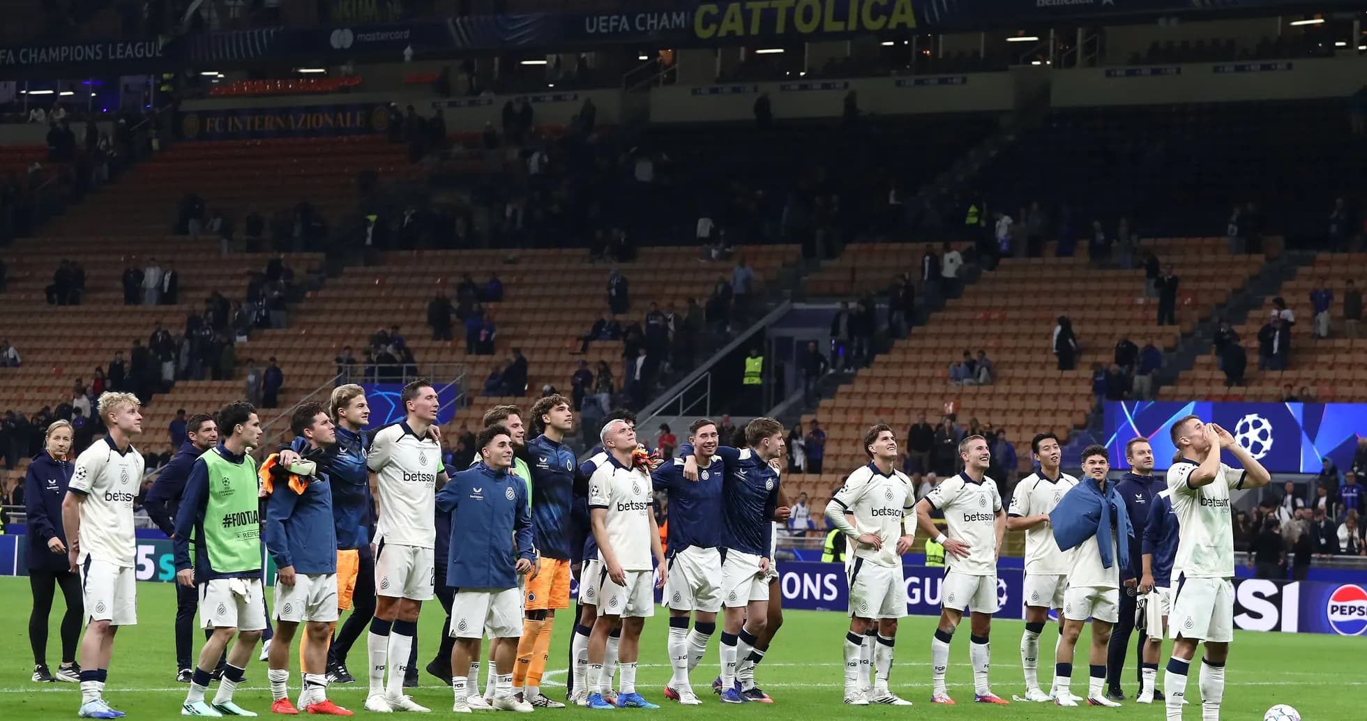 Équipe célébrant après un match de la Ligue des champions