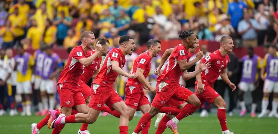Joueurs suisses célébrant un but