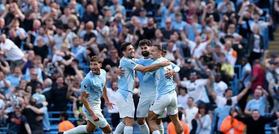 Joueurs de Manchester City célébrant un but