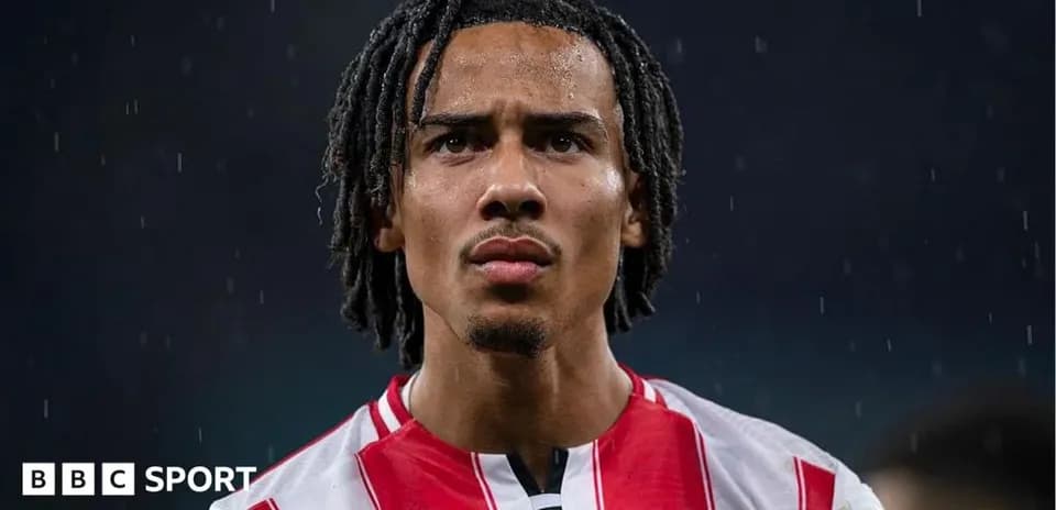 Joueur de Brentford sous la pluie en match