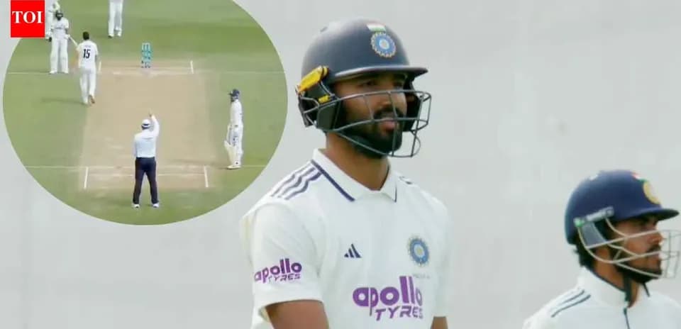 Batsman walking to crease during cricket match