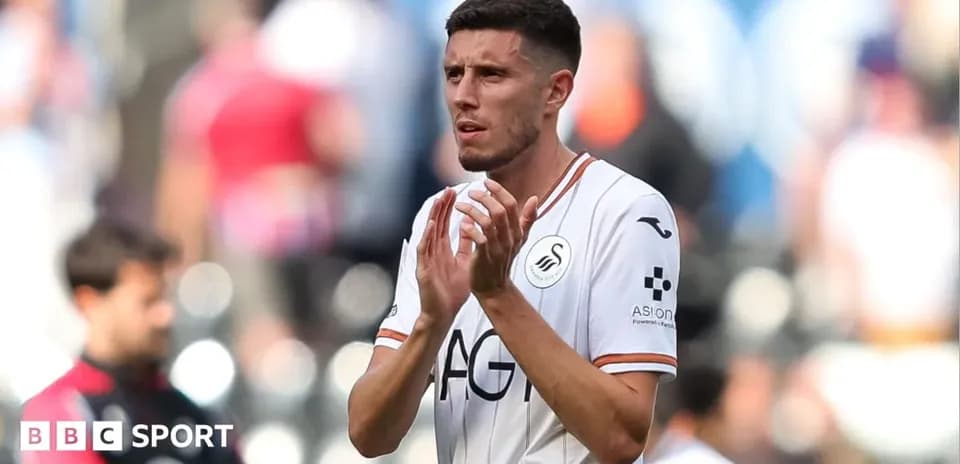 Joueur de Swansea City applaudissant les supporters