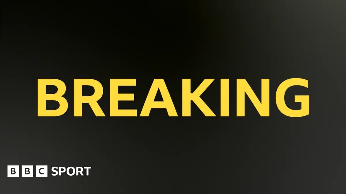 Texte 'BREAKING' en jaune sur fond noir