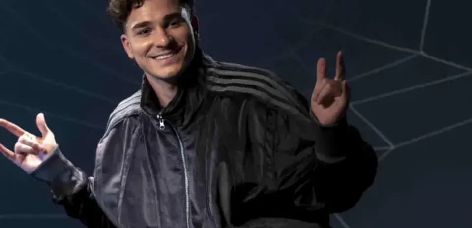 Person posing with peace sign and smile