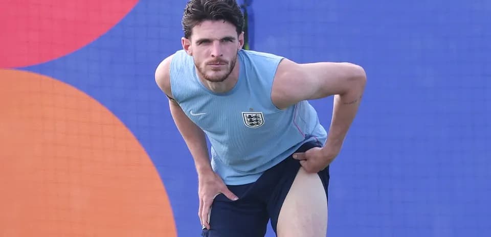 Joueur s'étirant lors d'un entraînement