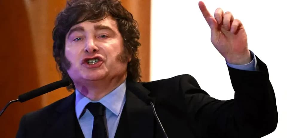 Person speaking passionately at a podium