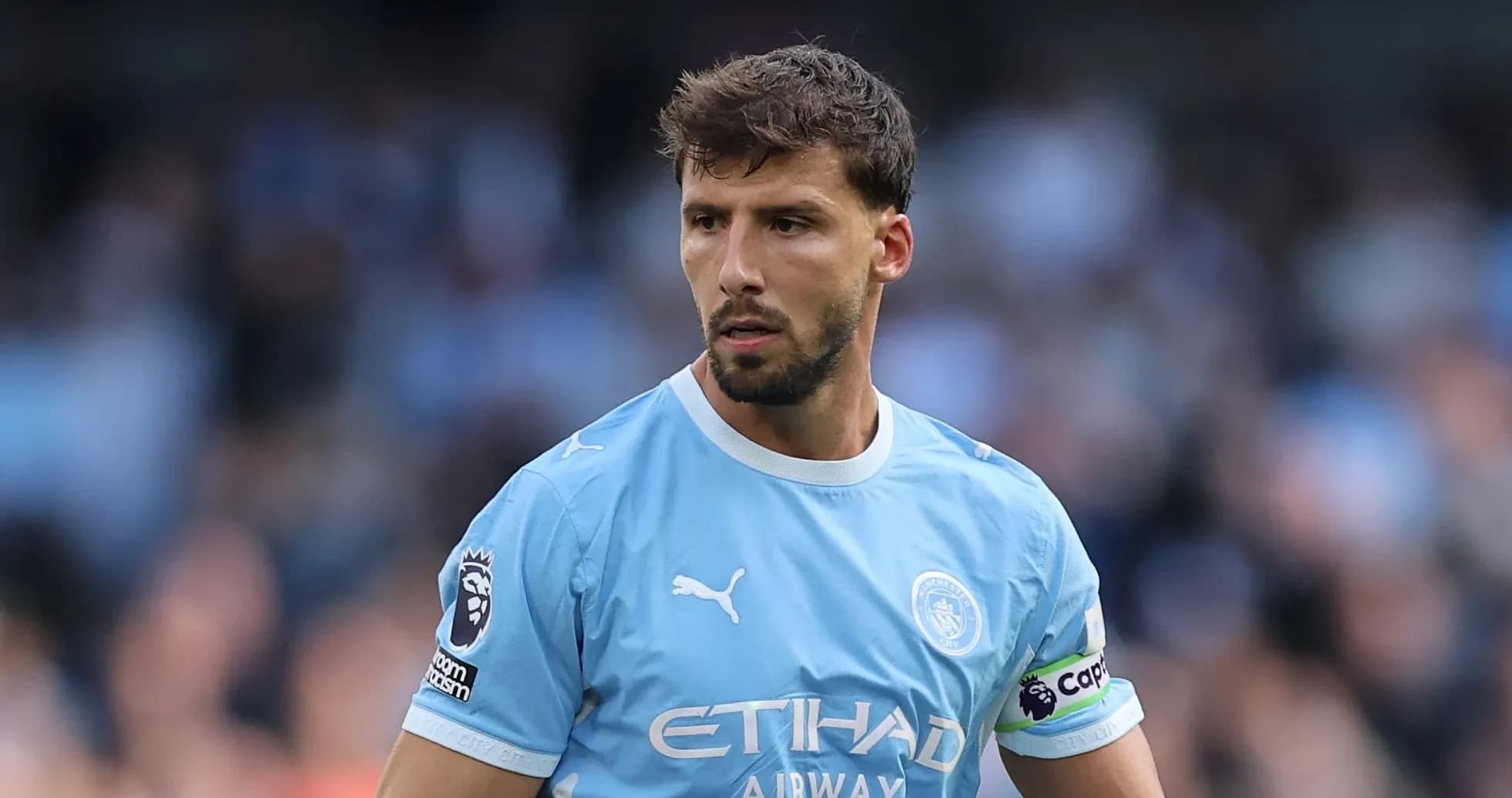 Joueur de Manchester City en action sur le terrain