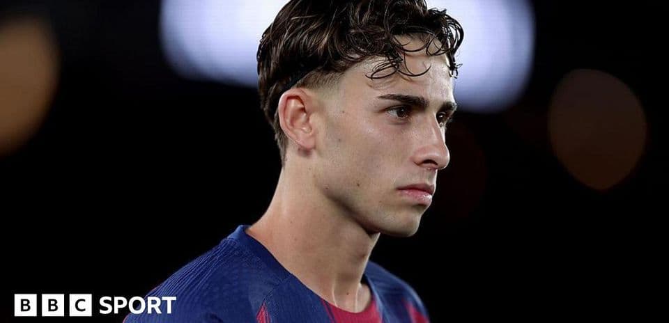 Joueur en tenue de Barcelone lors d'un match