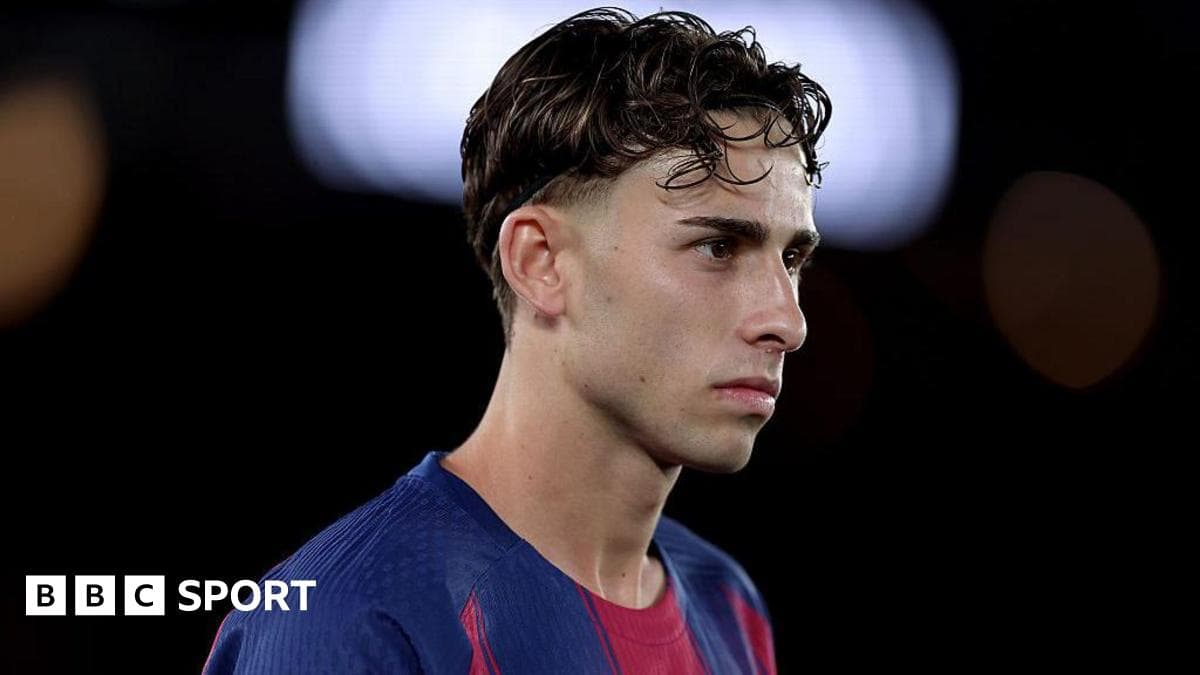 Joueur en tenue de Barcelone lors d'un match