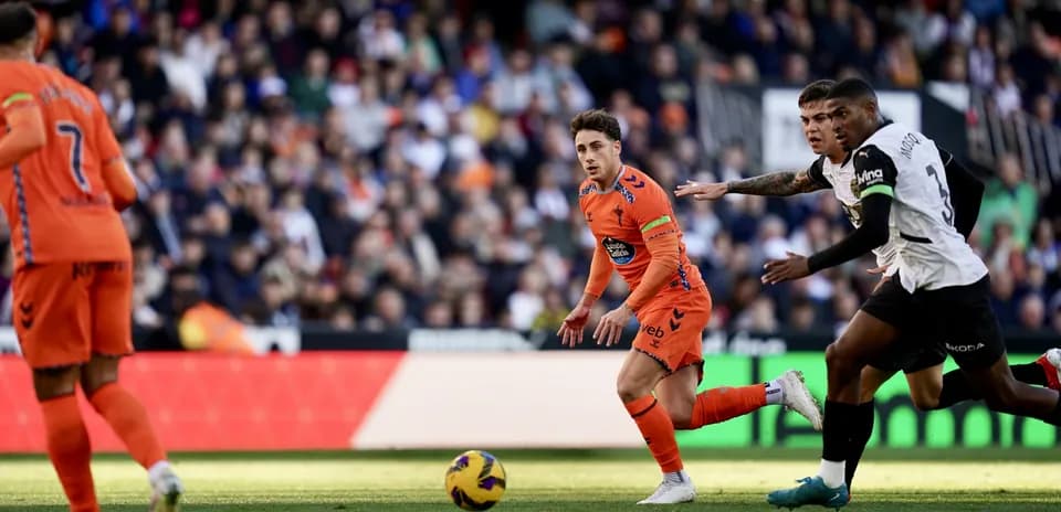 Joueurs en action lors du match Valencia-Celta Vigo