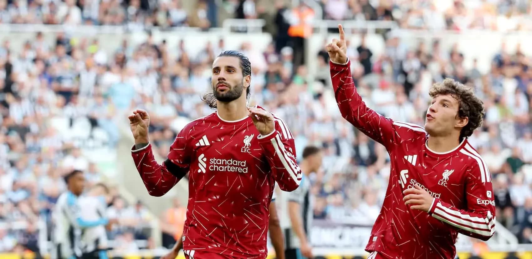 Joueurs de Liverpool célébrant un but en match