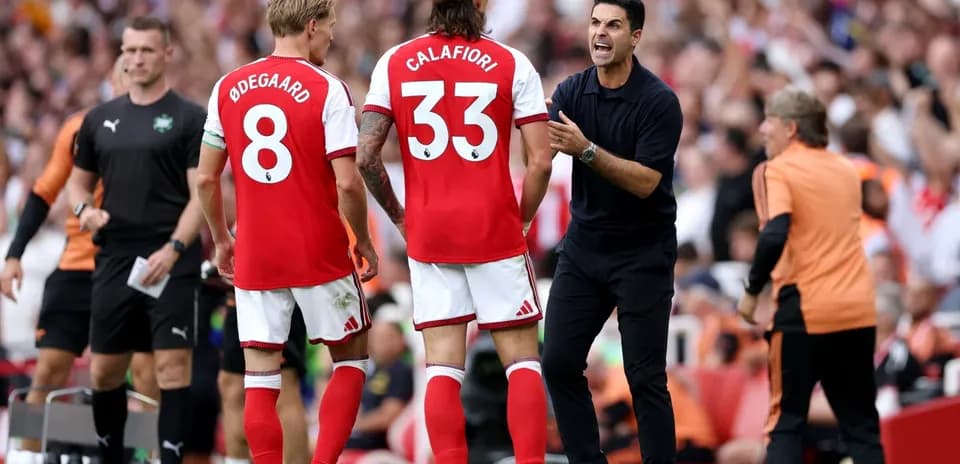 Mikel Arteta instructing players during a match