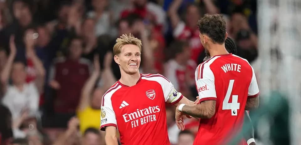 Joueurs d'Arsenal célébrant un but