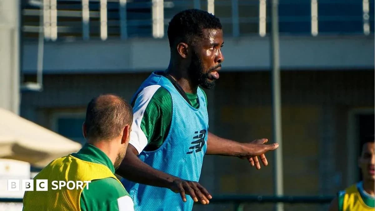 Joueur s'entraînant avec d'autres sur le terrain