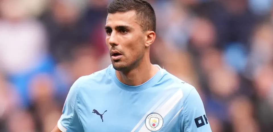 Joueur de Manchester City en action sur le terrain