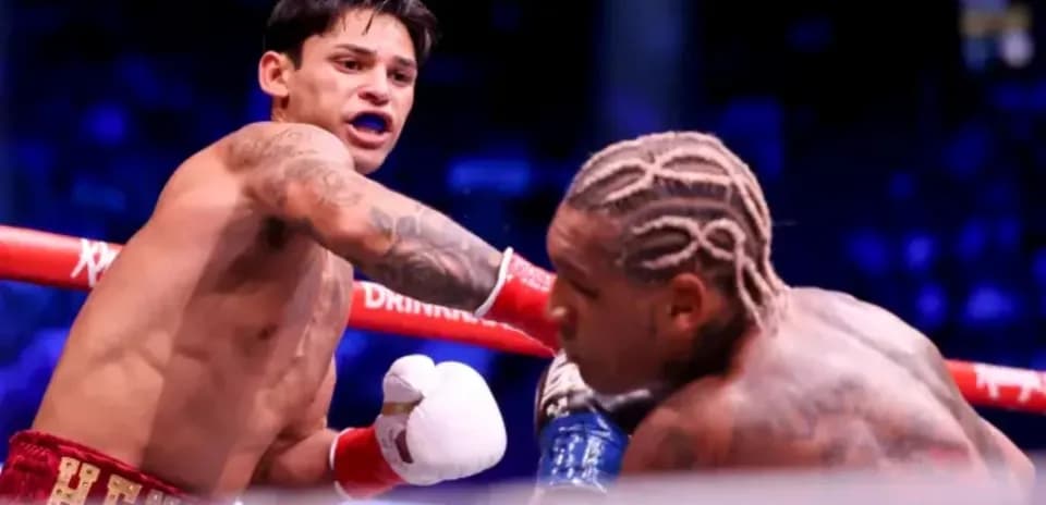 Boxer throwing a punch during a match