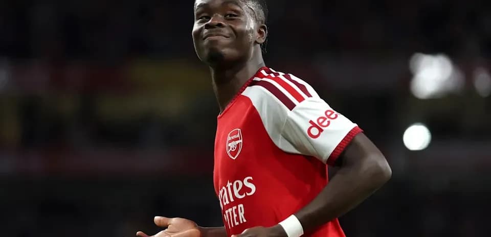 Joueur d'Arsenal célébrant un but sur le terrain