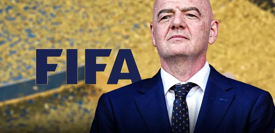Président de la FIFA devant un fond doré