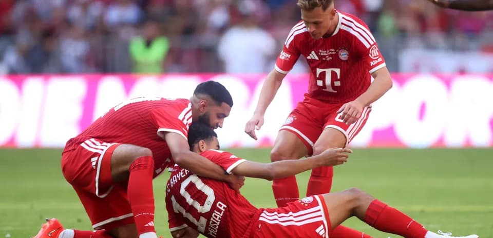 Joueurs du Bayern célébrant un but sur le terrain